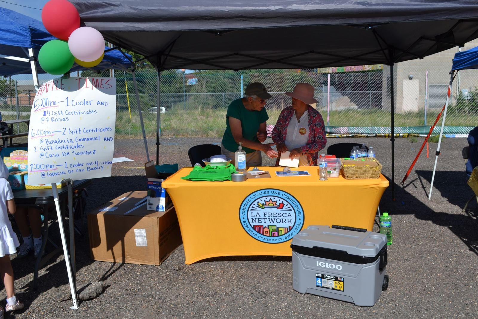 La Fresca Network table with raffle prizes at the Fest