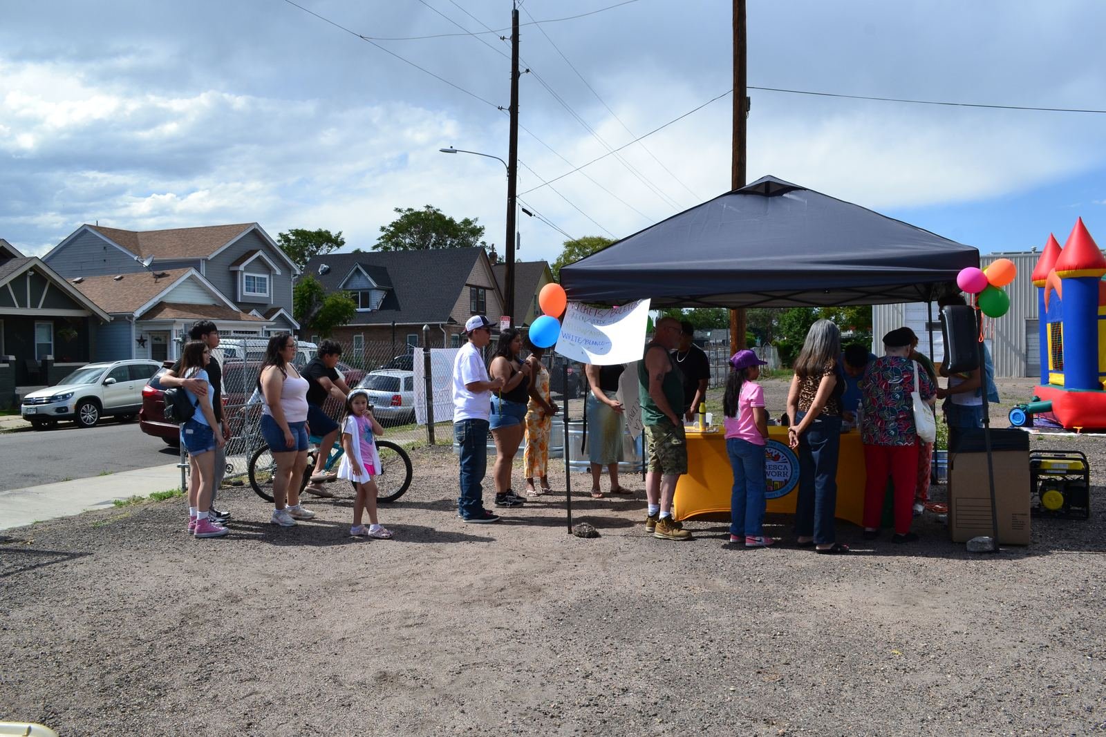 Neighbors visiting the La Fresca table at the Fest